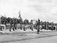 The pipe band of the Irish Fusiliers at the inspection of the 2 Canadian Corps by General Guy Simonds May 31, 1945.