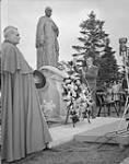 Rt. Hon. Maurice Duplessis and Cardinal Paul-Emile Leger unveiling a statue of Fr. Marie-Victorin 1954