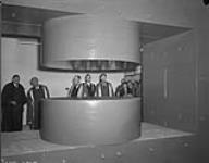 Drs. Niels Bohr and Ernest O. Laurence examining the cyclotron at McGill University 25 Oct. 1946