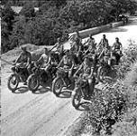 Despatch riders of the 1st Canadian Infantry Brigade outside Brigade Headquarters 12 Sept 1943