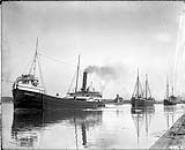 EDWARD SMITH with two unidentified barges 1907