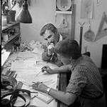 Norman McLaren and Evelyn Lambart editing films 1960