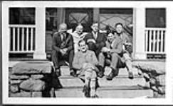 Sanatorium group on verandah steps includes N. Bethune (back row, first on left side) c.a. 1928