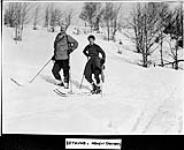 Dr. Norman Bethune and Helen Chisholm? on skis (from a copy negative) n.d.