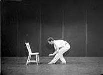 Frame from Norman McLaren/National Film Board 1957 film A Chairy Tale, which used animated objects and pixillation techniques. The story involved Claude Jutra pitted against a chair with a definite June 1957