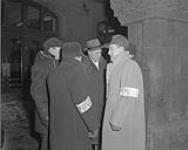 C.P.R. (Canadian Pacific Railway) strikers, members of the Brotherhood of Locomotive Firemen and Engineers picket outside Windsor Station's Main Entrance Jan. 1957