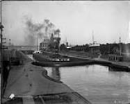 Great Lakes vessel - UMBRIA, 3/4 Stern in lock 1906
