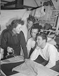 Signaller Henry Miller; AB Harry Booth; AB Rendal Todd; Wren Anne Smith, of H.M.C.S. ST. THOMAS Jan. 1945