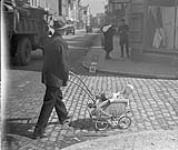German civilian walking in the streets 1 May 1945