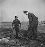 German prisoners burying their own dead 24 Mar. 1945