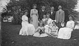 Unidentified group on lawn ca. 1909