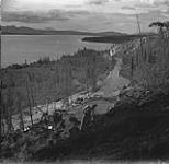 "Little Atlin Lake, Yukon Territory, seen from road under construction by the Canadian Army between Jake's Corner, Y.T., to Atlin, B.C., a gold mining centre on Big Atlin Lake." Aug. 1949