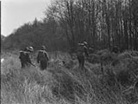 Trained to move across any type of ground under the battle conditions Canadian Scottish soldiers find the exercise a real conditioner for battle 22 Apr. 1944