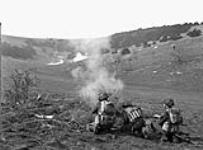 A two-inch mortar crew of The Regina Rifle Regiment taking part in a training exercise, Sussex, England, 18 April 1944 April 18, 1944.