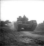Bren Armour tank of the 8th Canadian Infantry Brigade advancing in first stage of the attack of Caen 18-Jul-44