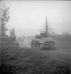 Bren Armour tanks of the 8th Canadian Infantry Brigade advancing in first stage of the attack of Caen 18-Jul-44