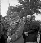 Captain Blum, General DeGaulle's representative, at a Mass celebrating Bastille Day 13-Jul-44