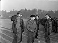 Field Marshal Bernard Montgomery inspecting the Queen's Own Rifles of Canada 25 Nov. 1945