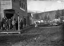 Street corner, showing Burkhard House and The Jewel, and a group of men 1897