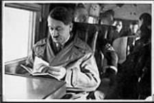 Adolf Hitler reading in an aircraft vers 1934 - 1939