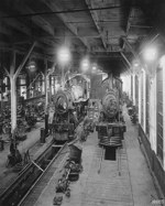 Grand Trunk Railway shop at night showing interior lighting and locomotives Nos. 414 and 1396 ca. 1918-1923