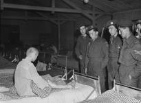 Prisoners in advanced state of starvation in a concentration camp liberated by the 3rd Canadian Infantry Division 24 Apr. 1945