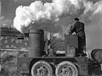 806 Company Smoke Pioneer Corp load up the Esso Smoke Machines 13 Ot. 1944