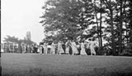 Dancers in Greek costume taking part in garden party at 'Benvenuto', Sir William Mackenzie's residence June 1, 1916
