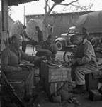 Personnel of the 1st Canadian Parachute Battalion repairing boots, Brelingen, Germany, 14 April 1945 April 14, 1945.