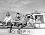 Prince Albert National Park - children on board motorboat QUEEN for all-day cruise from Waskesiu to Kingsmere Portage Aug. 1948