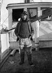 Koo noo, head man at Pond Inlet, aboard C.G.S. ARCTIC. [Takijualuk Tom Koonoo, a well-known interpreter.] Sept. 1922