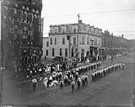 Orange Order parade, showing banner reading 'God Bless our Glorious Order' ca. 1915