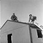 Inuit roofing a building September 1959.