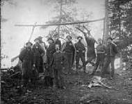 `Buckskin Club Meeting 1892': men with dogs and dead deer 1892