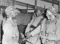 Forcemen of the First Special Service Force preparing to go on an evening patrol in the Anzio beachhead, Italy, ca. 20-27 April 1944 ca. April 20-27, 1944.