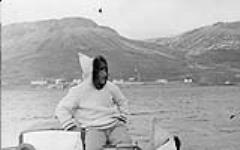 Inuit man aboard supply boat 6 September 1945.