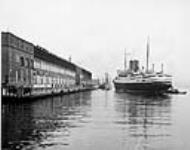 S.S. BERLIN of North German Lloyd, arriving from Bremerhaven, Pier 21. S.S. BANTAM docked at Pier 20 20 Apr. 1957