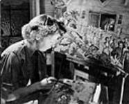 L'artiste canadienne Molly Lamb Bobak à son chevalet, peignant un tableau n.d.