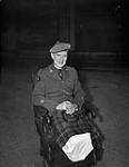 Major Frederick A. Tilston, Essex Scottish Regiment, at an investiture during which he received the Victoria Cross, Buckingham Palace, London, England, 22 June 1945 June 22, 1945.