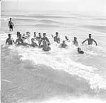 Infantrymen of the Hastings and Prince Edward Regiment swimming in the Mediterranean Sea, Sicily, 20 August 1943 August 20, 1943.