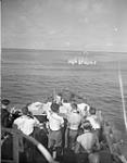 View from H.M.C.S. KOOTENAY, which has fired Hedgehog charges during the action in which Escort Group 11 sank the German submarine U-621, 18 August 1944. H.M.C.S. OTTAWA is visible in the background August 18, 1944