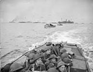 Infantrymen of Le Régiment de la Chaudière in a Landing Craft Assault (LCA) from H.M.C.S. PRINCE DAVID during a training exercise, England, 9 May 1944 May 9, 1944.