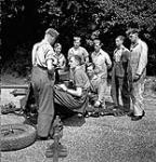 Infantrymen of the Perth Regiment manning an anti-tank gun during a training exercise, England, 11 June 1943 June 11, 1943