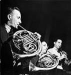 Members of Lucio Agostini's orchestra, which plays much of the music heard in National Film Board productions 1943