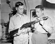 A Russian-made 4mm burp-gun presented to H.M.C.S. ATHABASKAN, Captain Reed 11 May 1953
