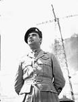 Major R.F. Routh, the first Commanding Officer of the S-14 Canadian Parachute Training School (Canadian Army Training Centres and Schools), in front of the 250-foot High Tower, Camp Shilo, Manitoba, Canada, 11 August 1943 August 11, 1943.