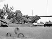 Major-General B.M. Hoffmeister, General Officer Commanding 5th Canadian Armoured Division, in the turret of the Sherman tank "Vancouver" near Castrocielo, Italy, 23 May 1944 May 23, 1944.