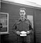 An unidentified officer of the 1st Canadian Parachute Battalion posing for an identification photo, England, 1943 1943.