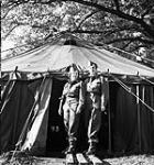 Nursing Sisters outside the operating room tent of No.2 Casualty Clearing Station, Royal Canadian Army Medical Corps (R.C.A.M.C.), England, November 1942 November 1942.