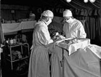 Minor surgery taking place at No.6 Casualty Clearing Station, Royal Canadian Army Medical Corps (R.C.A.M.C.), England, 11 October 1943 October 11, 1943